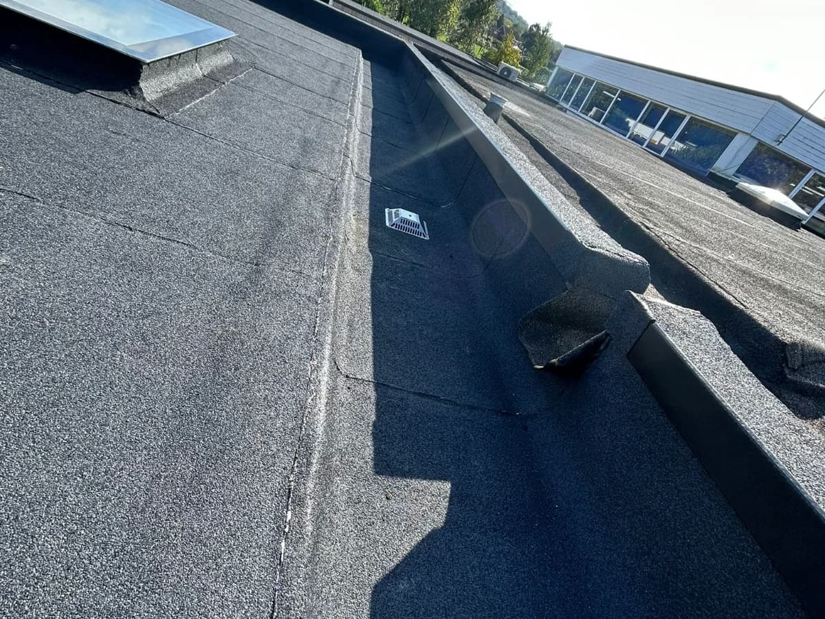 Completed commercial flat roof with a parapet detail in the North East