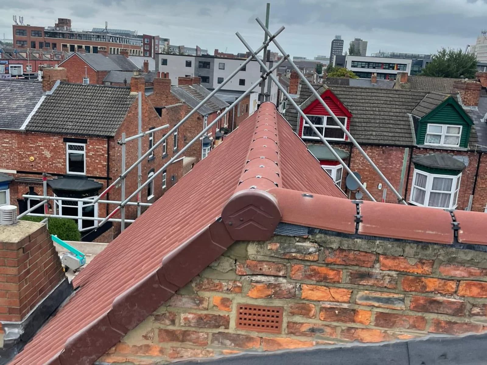 Completed tiled hip-and-ridge roof on a terrace in County Durham